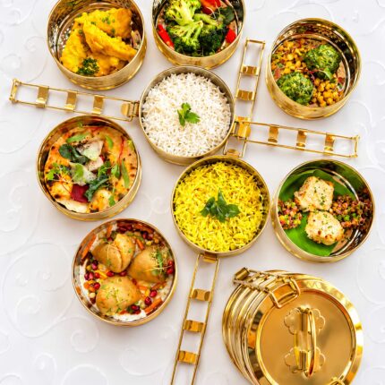 Premium Indian takeaway tiffin boxes filled with authentic curries in Blackheath.