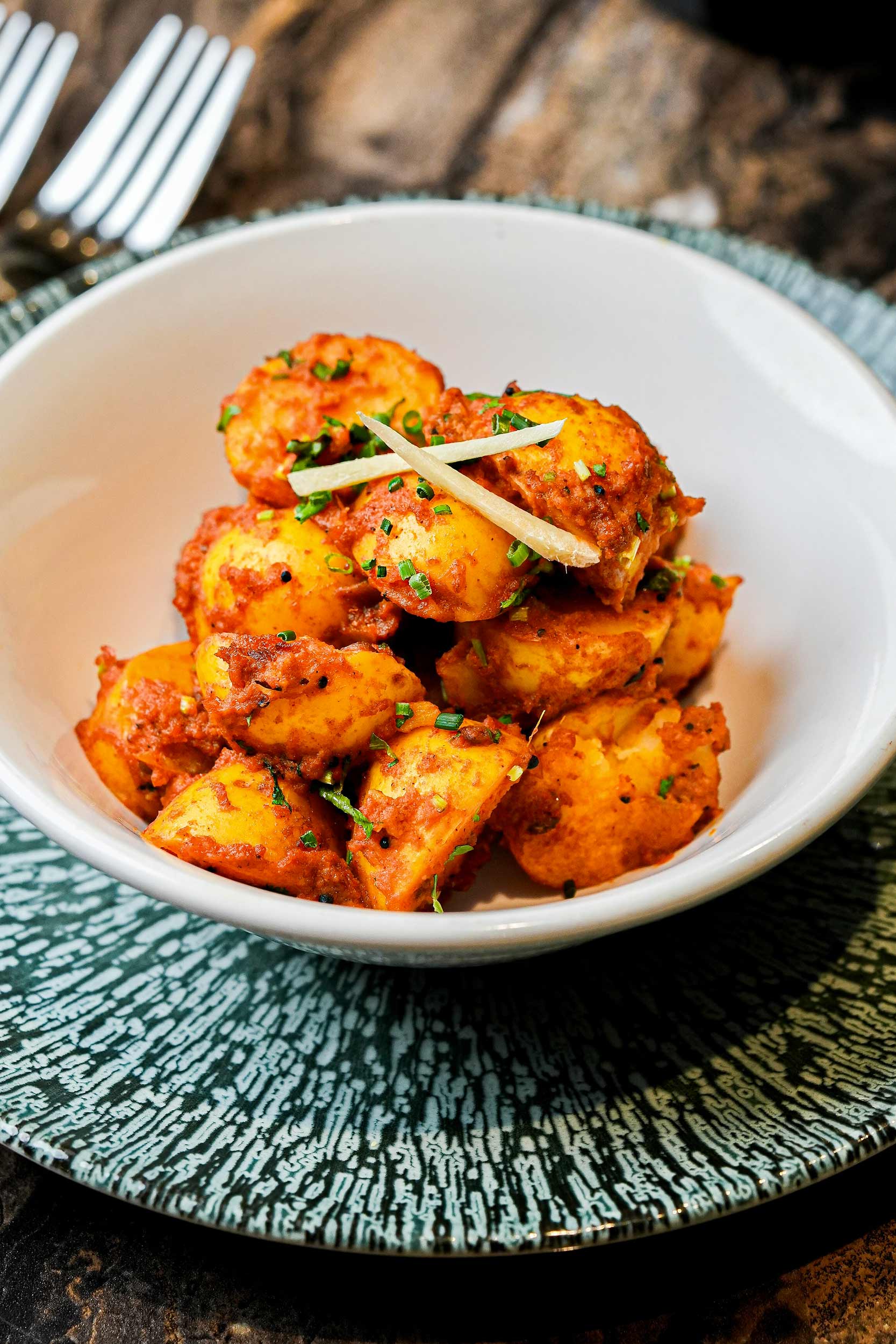 Freshly prepared Indian dishes for collection at Panas Restaurant Blackheath.
