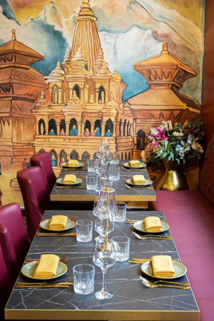 Elegant, comfortable table settings ready for guests at Panas Gurkha restaurant.