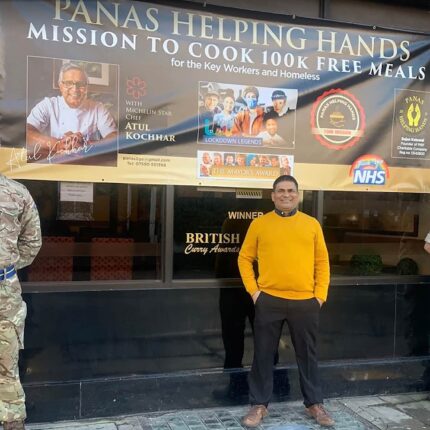 Panas founder with representatives from The Brain Trust Global Charity at a community event.