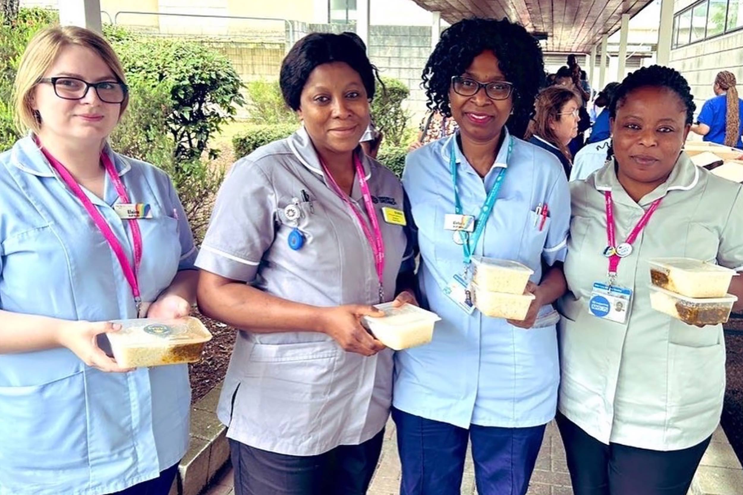 Delivering free hot Nepalese curry meals to hardworking NHS staff at local hospitals.