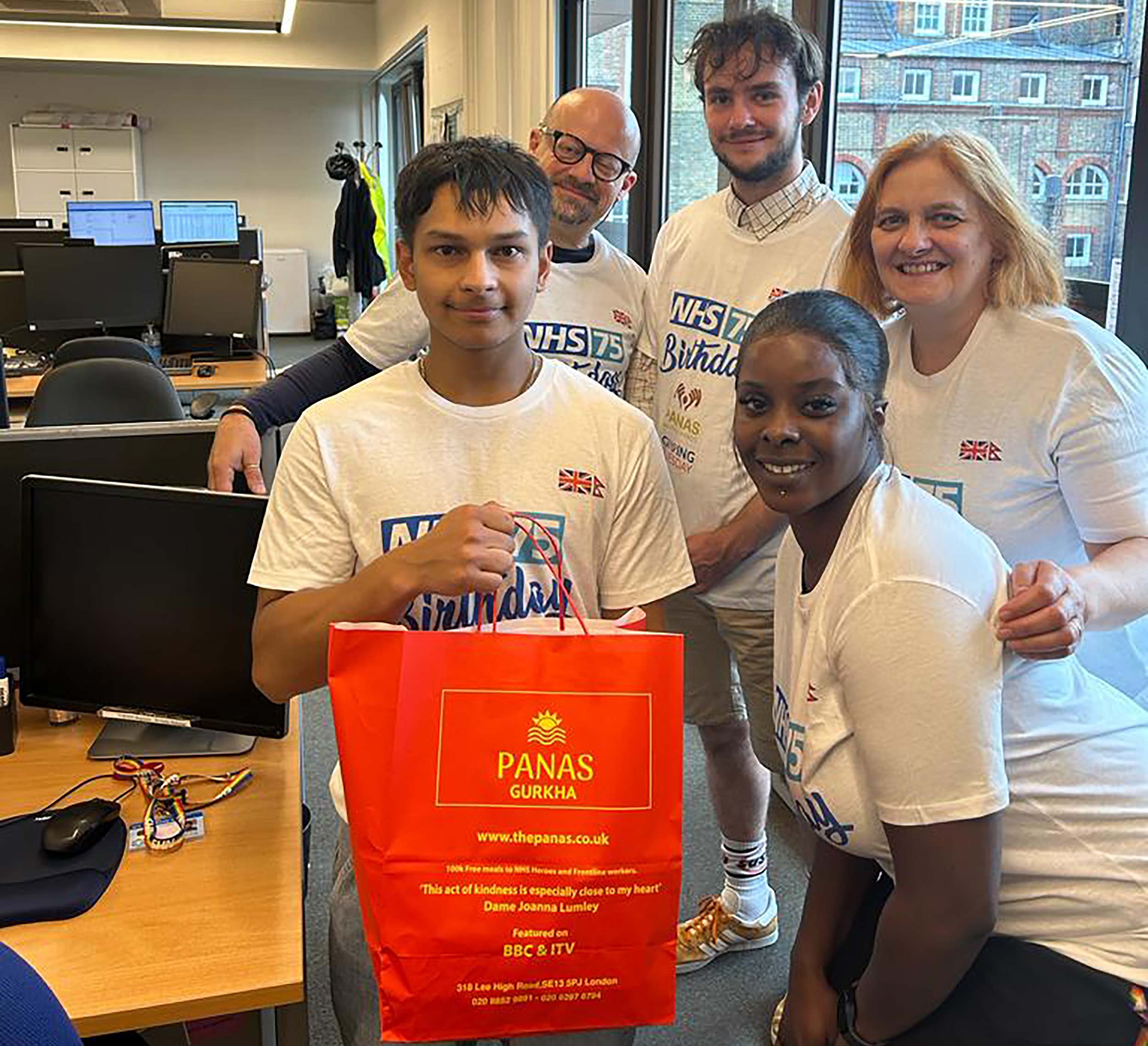 Panas Gurkha staff distributing fresh food donations to healthcare heroes in London.