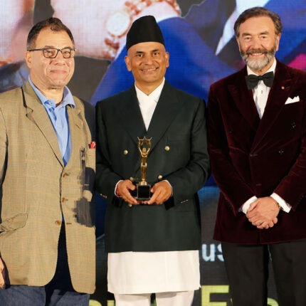 Sujan Katuwal MBE of Panas Restaurant celebrating at the British Asian Awards.