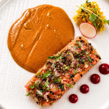 Gourmet spiced salmon dish with rich masala sauce from the Christmas party menu at Panas Gurkha Restaurant in Blackheath.